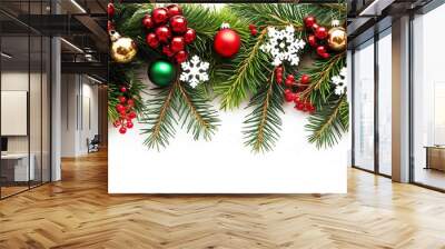 Festive Christmas decorations with pine branches, ornaments, and snowflakes on white background. Wall mural